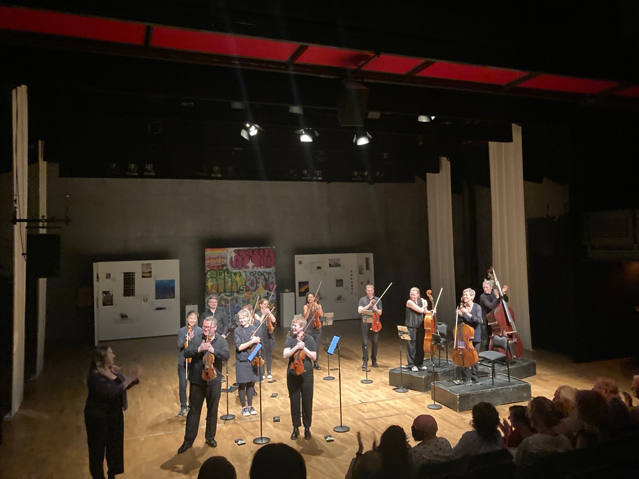Scottish Ensemble accepting applause on stage