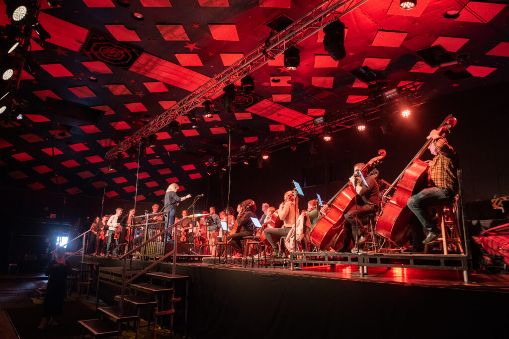 Large String orchestra performing at Bridge festival